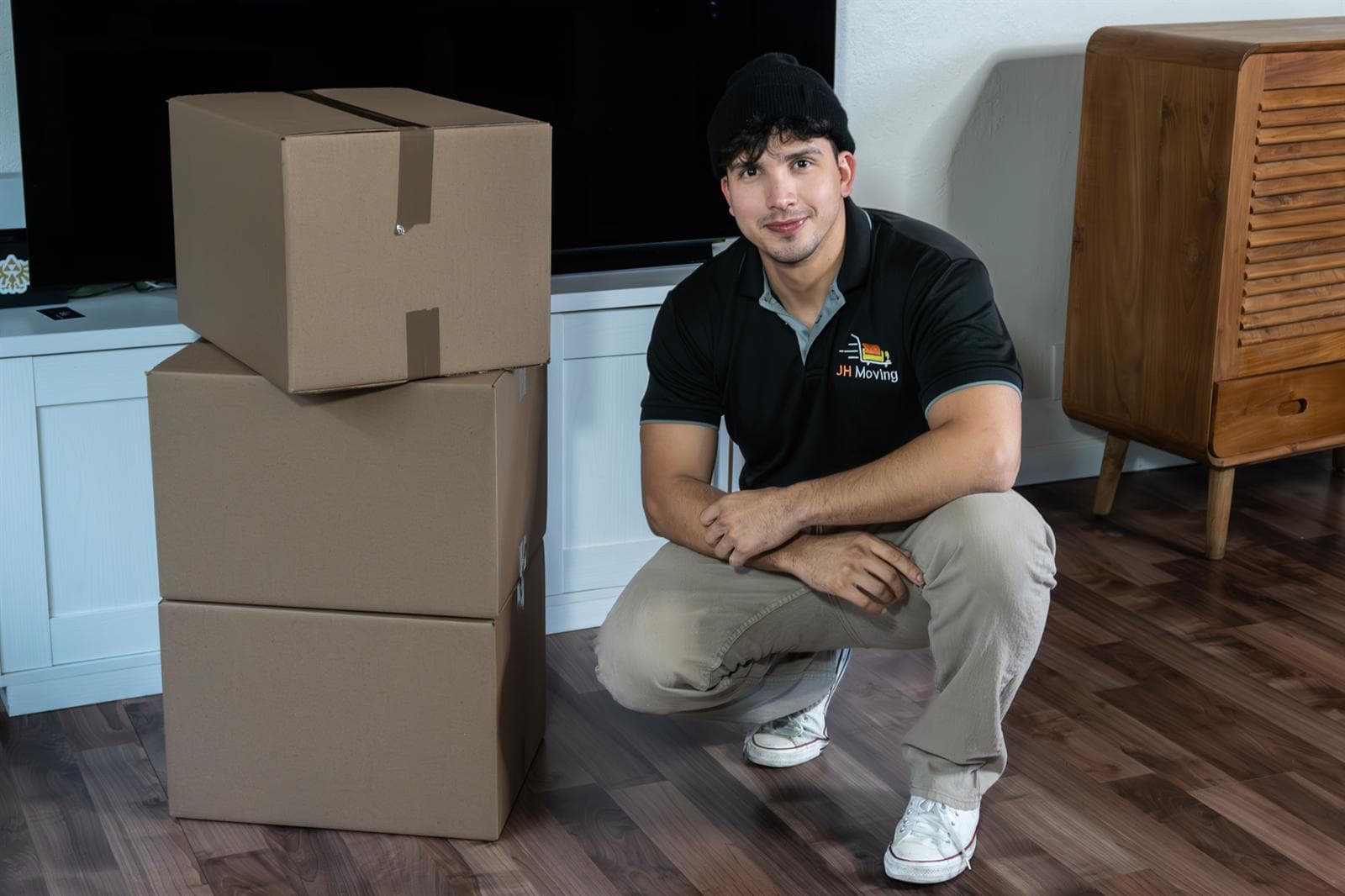 packing services — JH Moving crew at work