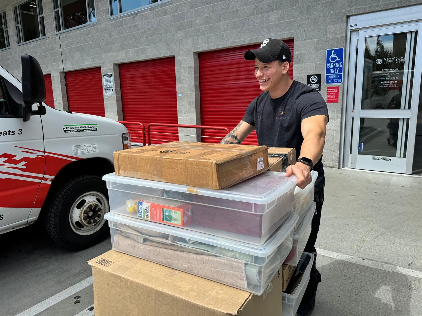 packing services: JH Moving team wrapping and loading